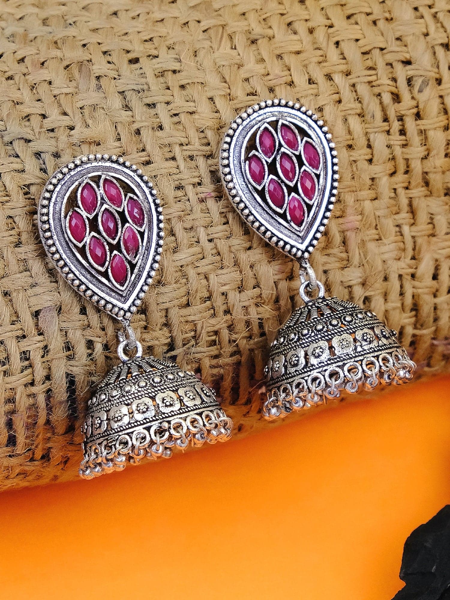 Silver Glimmer: Oxidised Jhumka Earrings with Distinctive Charm